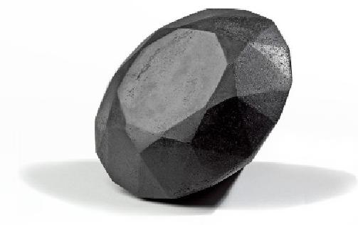 Alicja Kwade, Lucy, 2004-2006, Charbon noir compressé et agent adhésif, 14 x 14 x 18 cm  Collection de l'artiste - Courtesy König Galerie, Berlin, © Alicja Kwade - Photo Matthias Kolb 
